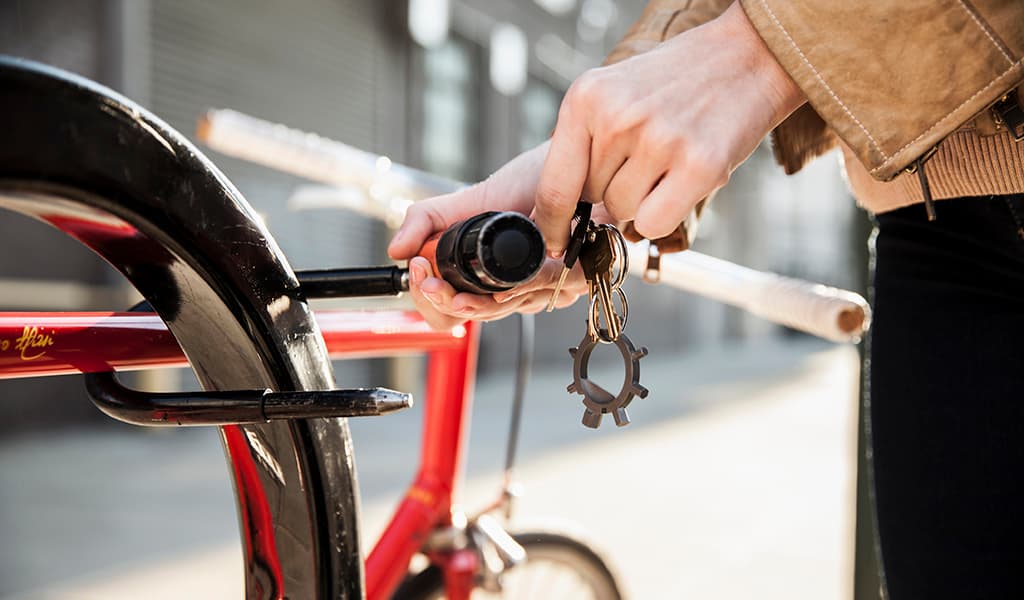 Ringtool V1 Gold — on keychain at bike